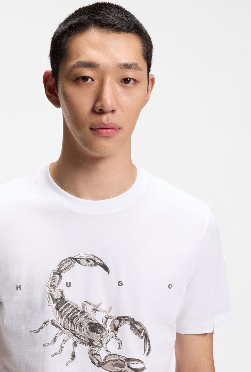 Front image of a model wearing Discorb t in white, by brand Hugo
