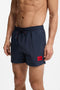 Front image of a model wearing the Dominica swimshorts in navy, by brand Hugo
