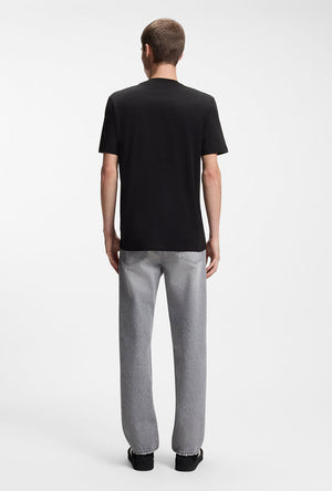 Back image of a model wearing the Dostino t in black, by brand Hugo