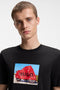 Front image of a model wearing the Dostino t in black, by brand Hugo