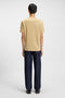 Back image of a model wearing the Dulivio t in beige, by brand Hugo
