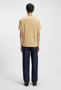 Back image of a model wearing the Dulivio t in beige, by brand Hugo