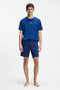 Front image of a model wearing the Laze shorts in blue, by brand Hugo
