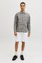 Front image of a model wearing the Rick original shorts in white, by brand Jack&jones