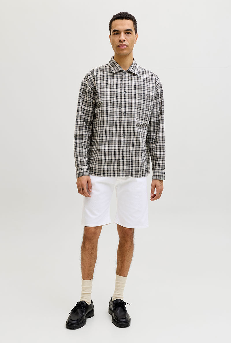 Front image of a model wearing Rick original shorts in white, by brand Jack&jones