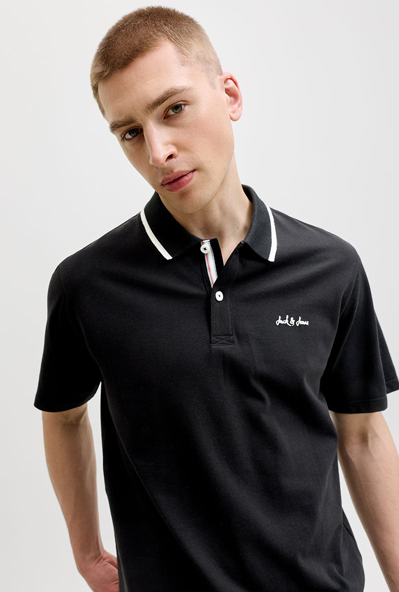 Front image of a model wearing Blaze s/s polo in black, by brand Jack&jones