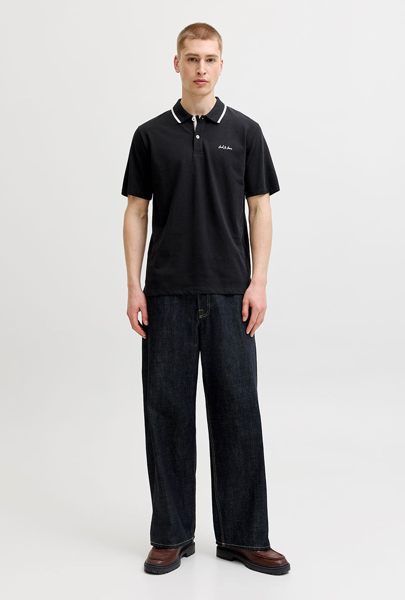 Front image of a model wearing Blaze s/s polo in black, by brand Jack&jones