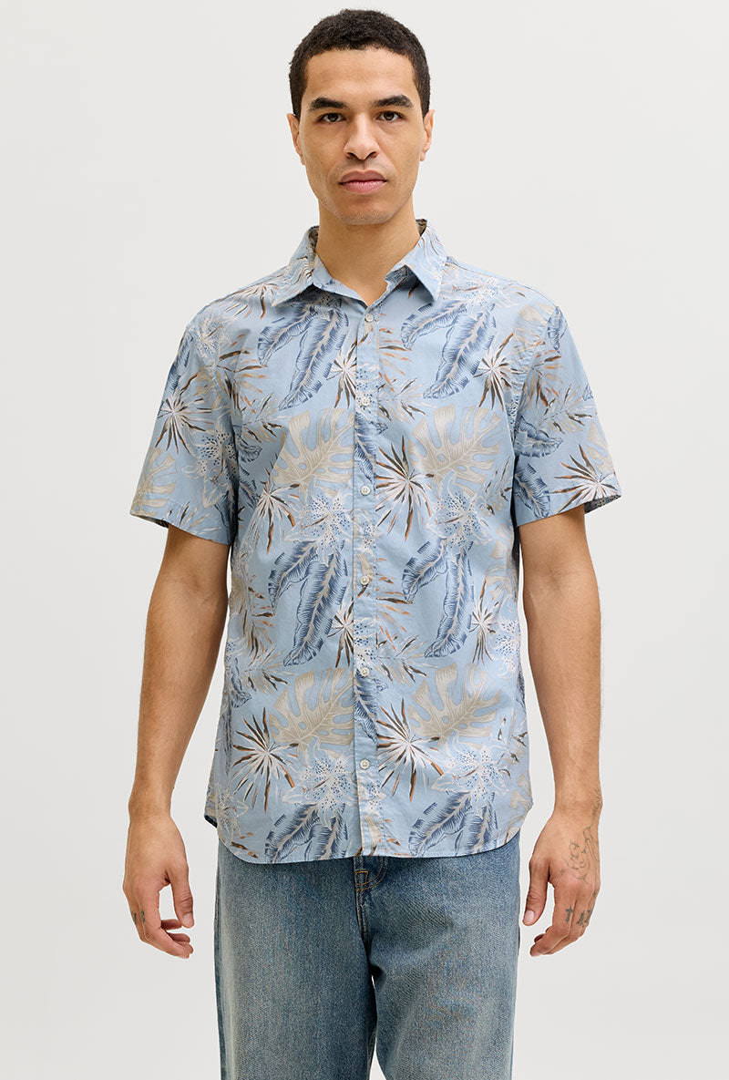 Front image of a model wearing Honolulu aop ss shirt in blue, by brand Jack&jones