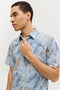 Front image of a model wearing the Honolulu aop ss shirt in blue, by brand Jack&jones