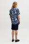 Back image of a model wearing the Honolulu aop ss shirt in navy, by brand Jack&jones