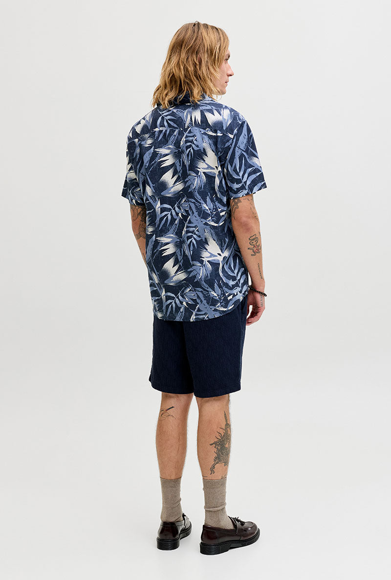 Back image of a model wearing Honolulu aop ss shirt in navy, by brand Jack&jones