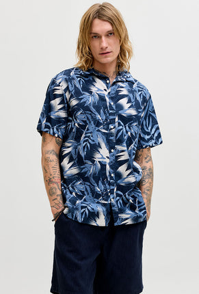 Front image of a model wearing Honolulu aop ss shirt in navy, by brand Jack&jones