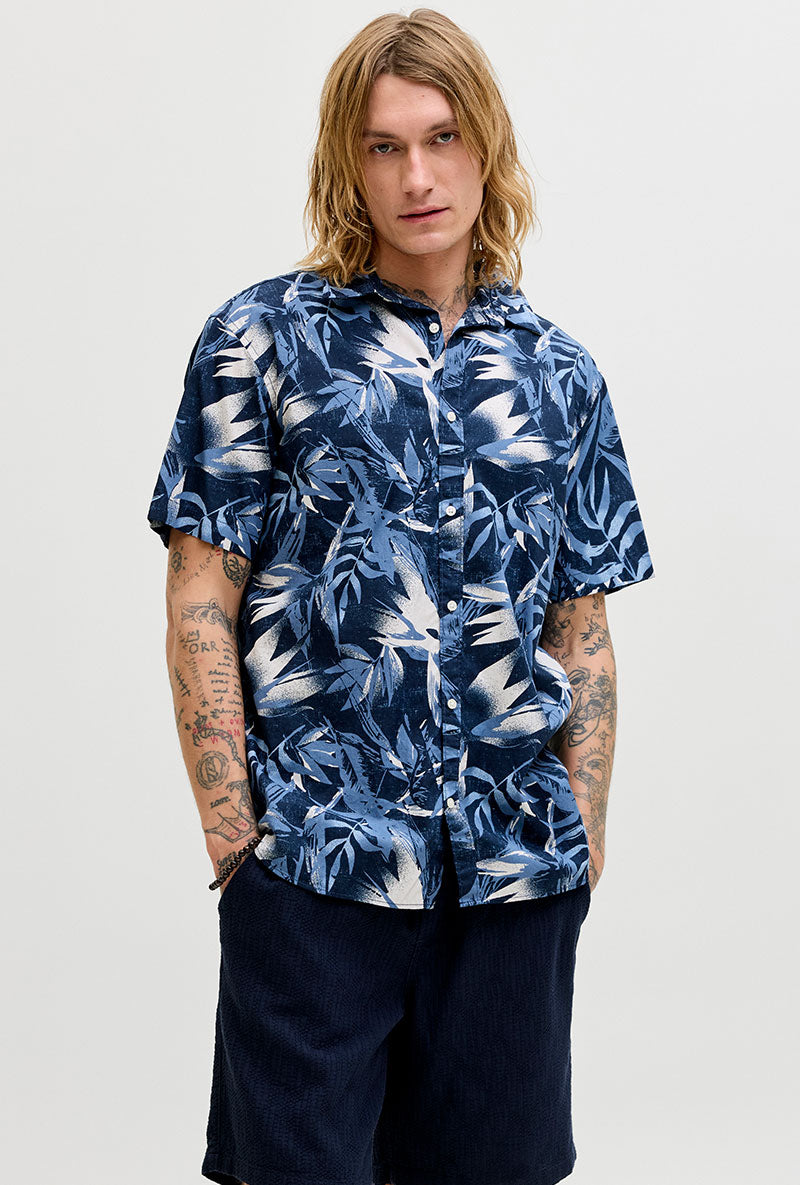 Front image of a model wearing Honolulu aop ss shirt in navy, by brand Jack&jones