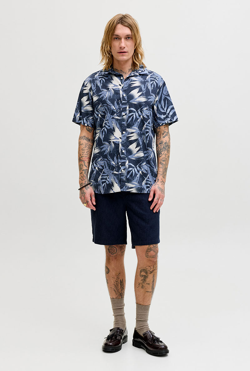 Front image of a model wearing Honolulu aop ss shirt in navy, by brand Jack&jones