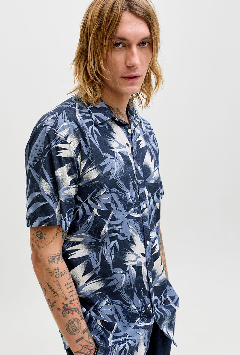 Front image of a model wearing Honolulu aop ss shirt in navy, by brand Jack&jones