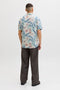 Back image of a model wearing the Honolulu aop ss shirt in off white, by brand Jack&jones
