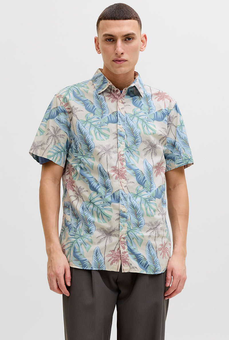 Front image of a model wearing Honolulu aop ss shirt in off white, by brand Jack&jones