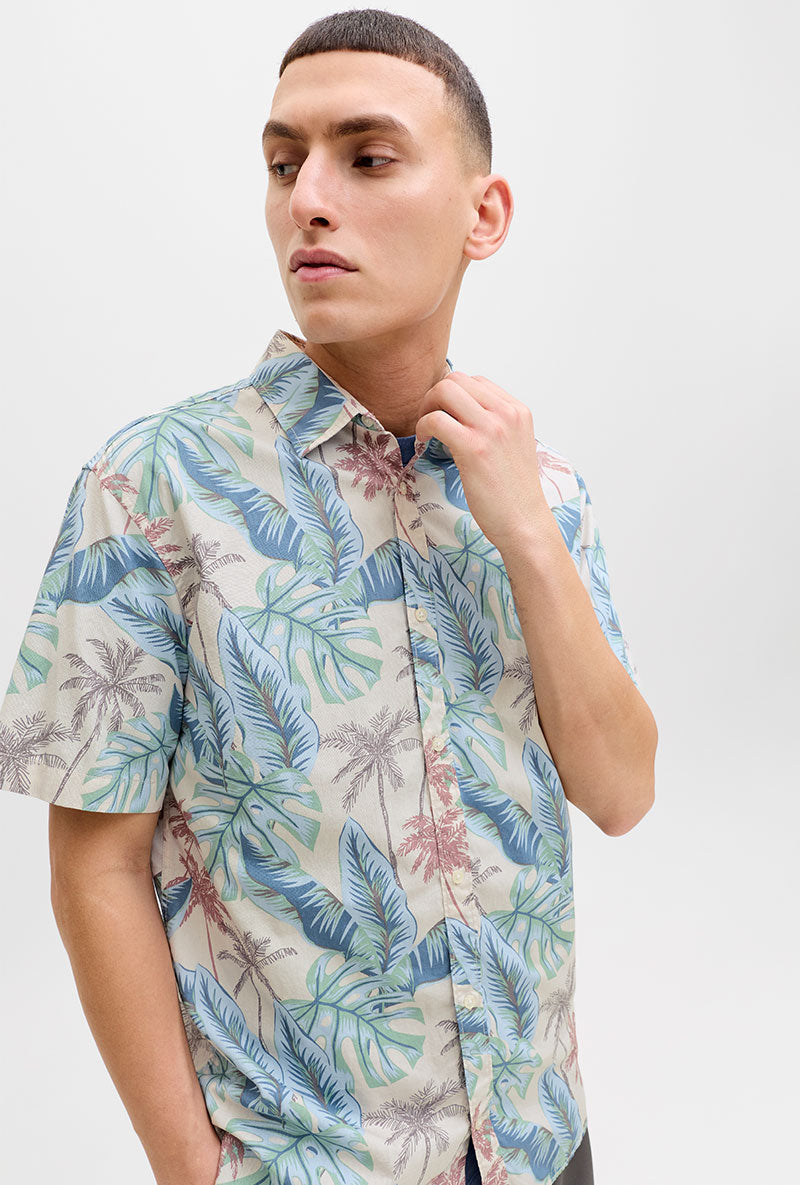 Front image of a model wearing Honolulu aop ss shirt in off white, by brand Jack&jones