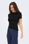 Front image of a model wearing Catie s/s assymetric top in black, by brand Jacqueline de yong