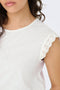 Front image of a model wearing the Salva life s/l crochet top in white, by brand Jacqueline de yong