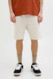 Front image of a model wearing Gordon bradley sweat shorts in stone, by brand Jack&jones
