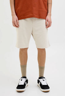 Front image of a model wearing the Gordon bradley sweat shorts in stone, by brand Jack&jones