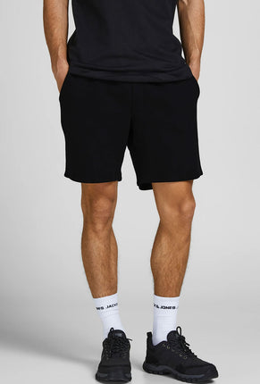 Front image of a model wearing Gordon bradley sweat shorts in black, by brand Jack&jones