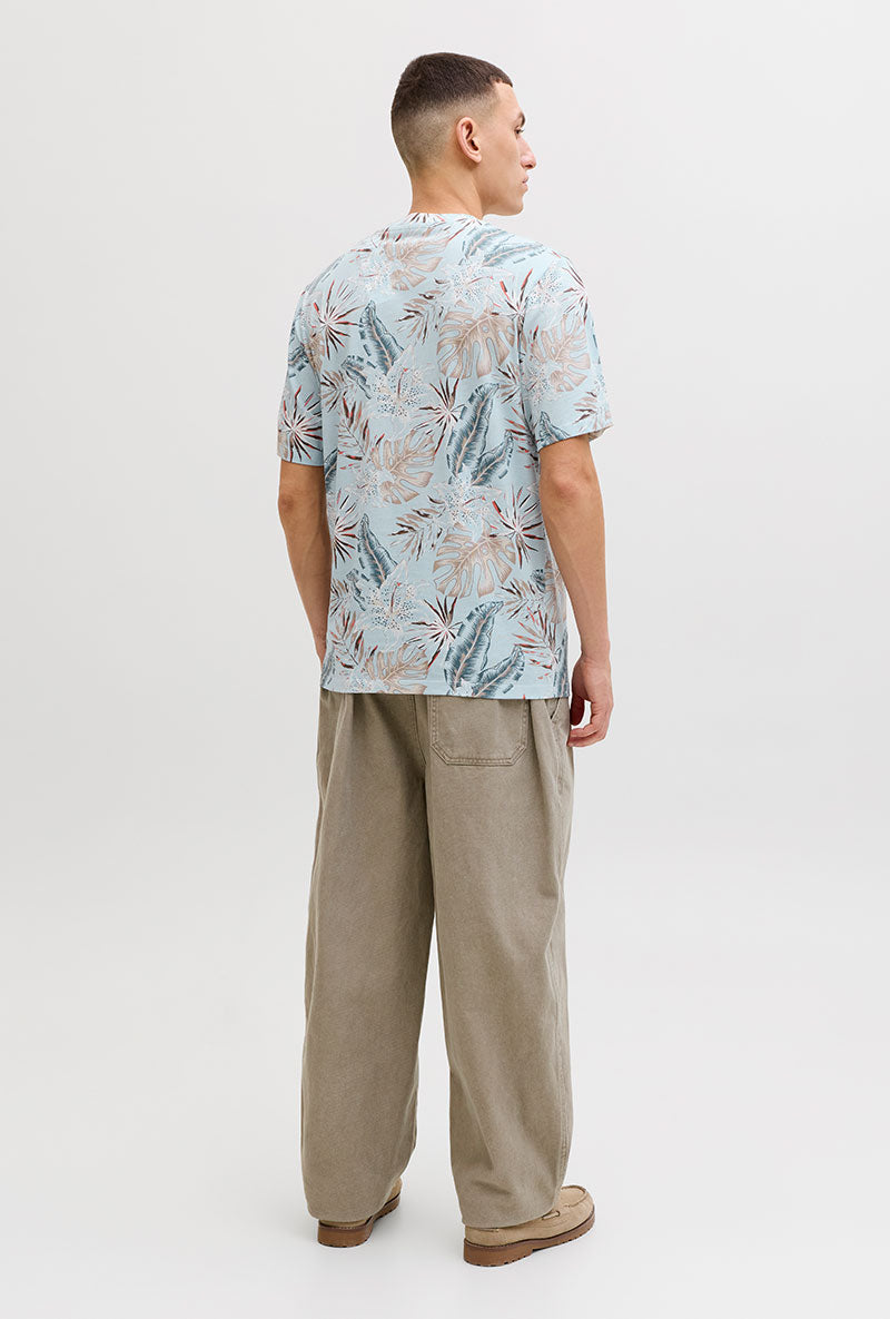 Back image of a model wearing Honolulu aop ss tee in blue, by brand Jack&jones