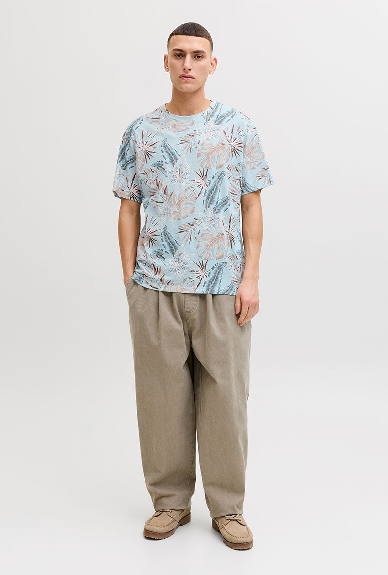 Front image of a model wearing Honolulu aop ss tee in blue, by brand Jack&jones