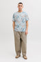 Front image of a model wearing the Honolulu aop ss tee in blue, by brand Jack&jones