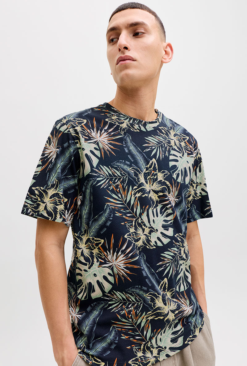 Front image of a model wearing Honolulu aop ss tee in navy, by brand Jack&jones