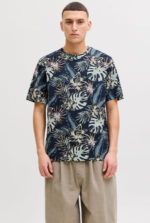 Front image of a model wearing the Honolulu aop ss tee in navy, by brand Jack&jones