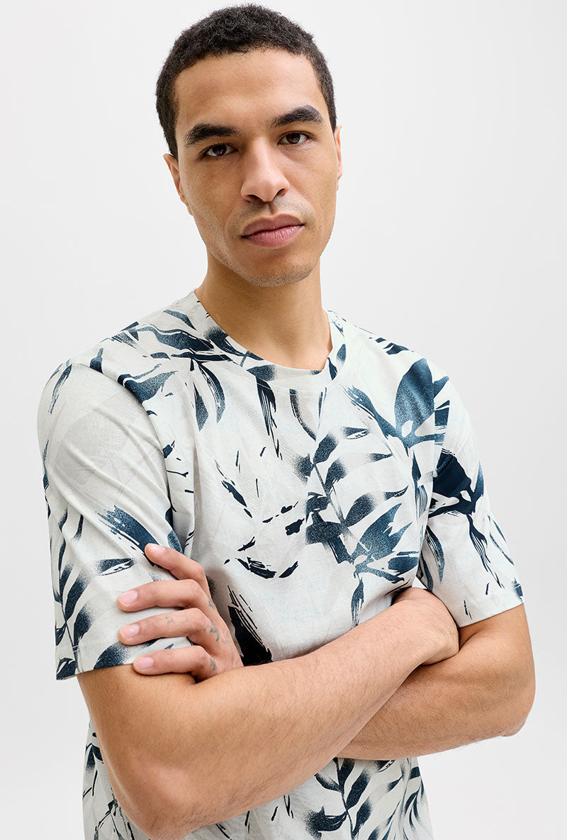Front image of a model wearing Honolulu aop ss tee in beige, by brand Jack&jones