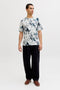 Front image of a model wearing the Honolulu aop ss tee in beige, by brand Jack&jones