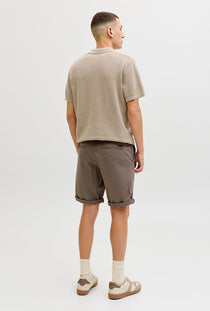Back image of a model wearing the Jess knit polo in stone, by brand Jack&jones