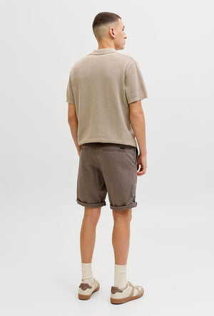 Back image of a model wearing the Jess knit polo in stone, by brand Jack&jones