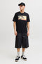 Front image of a model wearing the Indiana tee ss crew neck in black, by brand Jack&jones