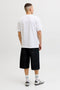 Back image of a model wearing the Indiana tee ss crew neck in white, by brand Jack&jones