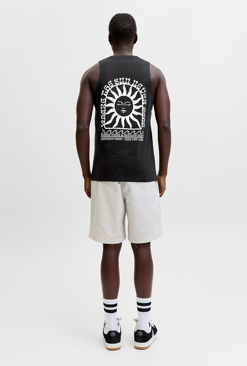 Back image of a model wearing Sunset back print sleeveless tshirt in black, by brand Jack&jones