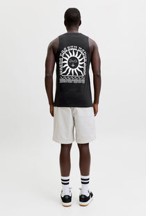 Back image of a model wearing the Sunset back print sleeveless tshirt in black, by brand Jack&jones