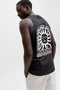 Back image of a model wearing the Sunset back print sleeveless tshirt in black, by brand Jack&jones
