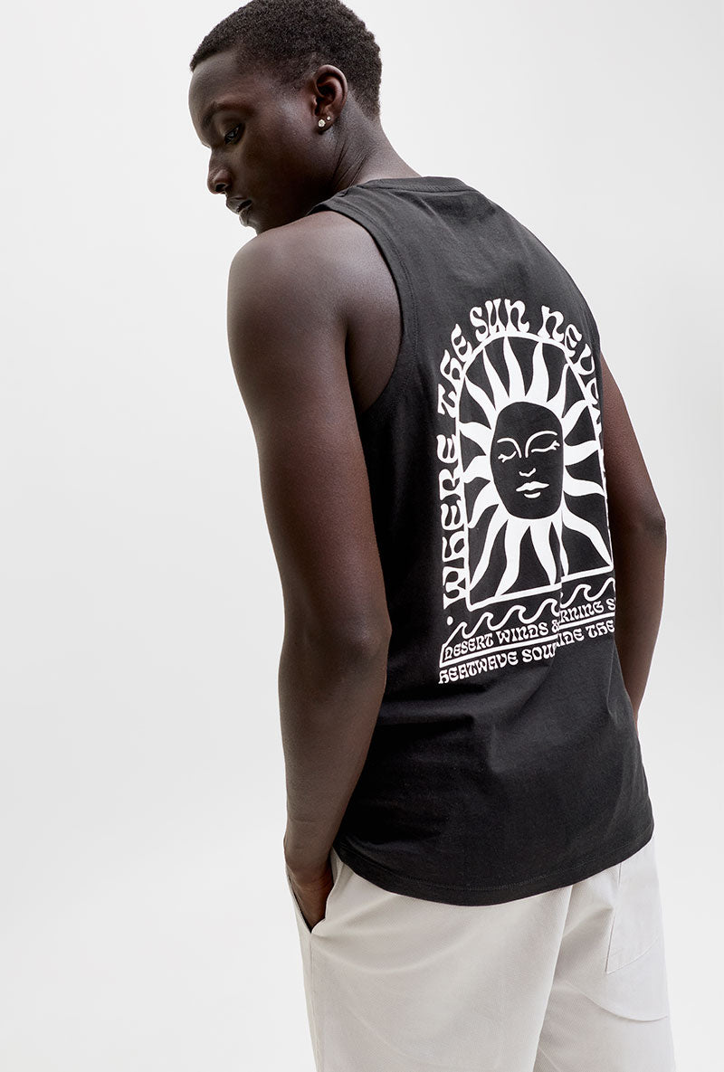 Back image of a model wearing Sunset back print sleeveless tshirt in black, by brand Jack&jones