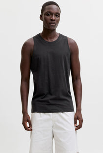 Front image of a model wearing the Sunset back print sleeveless tshirt in black, by brand Jack&jones