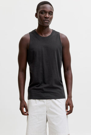 Front image of a model wearing the Sunset back print sleeveless tshirt in black, by brand Jack&jones