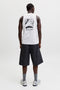 Back image of a model wearing the Sunset back print sleeveless tshirt in white, by brand Jack&jones