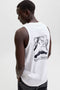 Back image of a model wearing the Sunset back print sleeveless tshirt in white, by brand Jack&jones