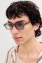 Front image of a model wearing the Avey sunglasses in light brown, by brand Jack&jones