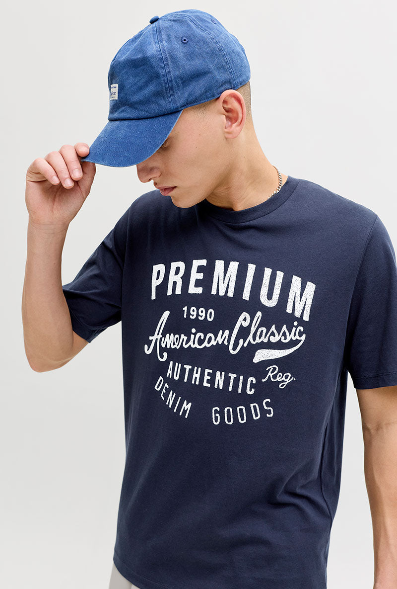 Side image of a model wearing Blu alex ss tee in navy, by brand Jack&jones