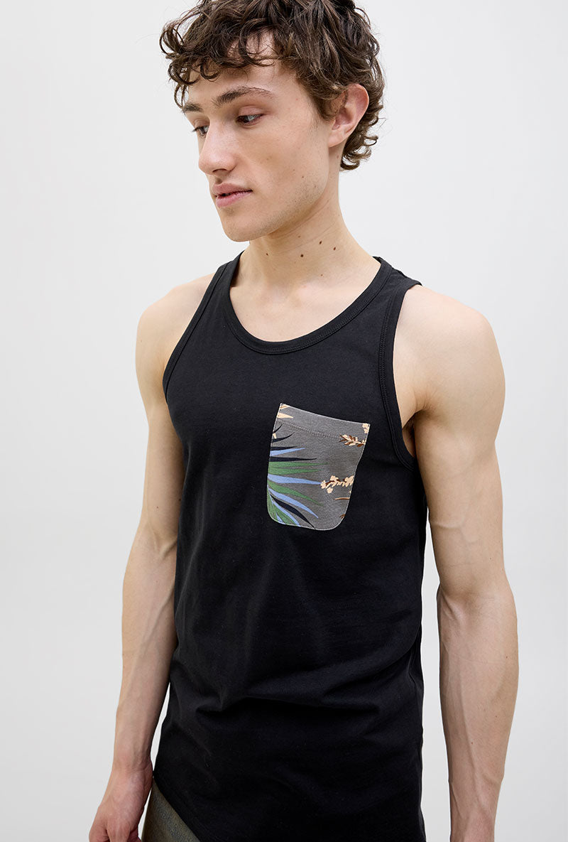 Front image of a model wearing Jack and jones hawaii pocket tanktop in black, by brand Jack&jones