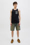 Front image of a model wearing the Jack and jones hawaii pocket tanktop in black, by brand Jack&jones